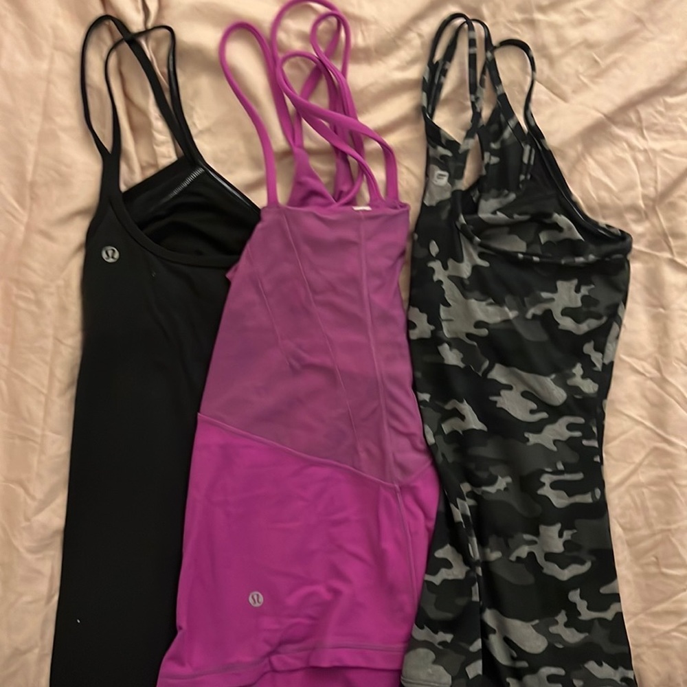 BUNDLE OF 3 work out tops. $45. 2 LULULEMON and 1 Fabletics   SIZE 4 and 6.